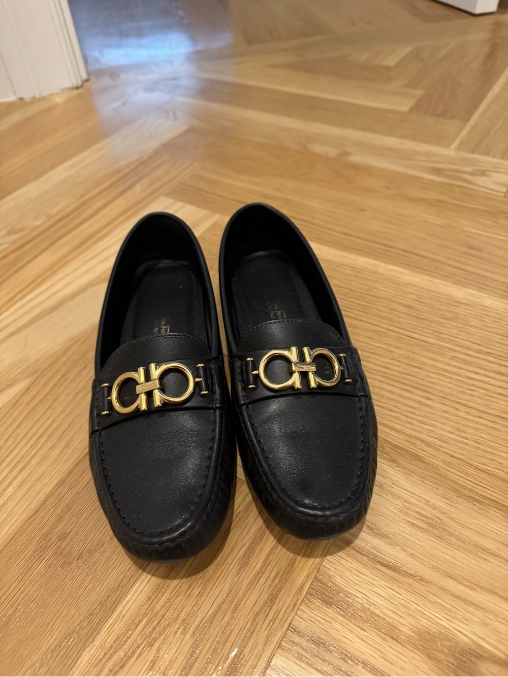 Salvatore Ferragamo Berra Black Leather Women’s Loafers with Gold Hardware
